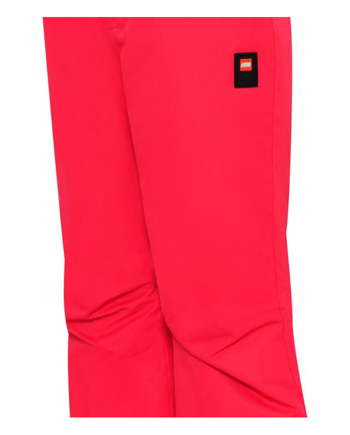 Bernumode | LEGO® Wear Tec: Kids' waterproof ski pants, LWPAYTON 701 (120 g.) €44.01 LEGO® ski pants for girls and boys
These monochrome LEGO® ski pants are a part of the ACTION series which is developed especially for skiing. Therefore, they are equipped with several practical details for that exact purpose – but they are also ideal for everyday use.
The durable ski pants have a water column of 5.000-8.000 mm and are produced with taped seams. They are windproof and breathable, too, which is essential when you are being active in the snow. They are made of durable fabric and have extra reinforcements at the leg openings. Inside at the leg openings, there is an elasticated snow skirt which is pulled over the boots, so that the snow is kept out.
THIS IS WHY YOU WILL LOVE THE TEC SKI PANTS

The ski pants are created for active play in the snow, so they are breathable and windproof
They are reinforced at the bottom hem to protect from wear and tear
The ski pants for children are designed with adjustable suspenders
There is a snow skirt inside the leg opening

The children's ski pants are closed by means of a YKK zipper, a snap button and hook and loop closure at the waist. The ski pants are elasticated at the sides for a comfortable fit. In addition to that, there are adjustable, removable, and elasticated suspenders with lovely LEGO brick details on them of the uni-coloured ski pants. The ski pants are treated with Bionic-Finish ECO which is a fluorine-free impregnation. They have one zipper pocket on the front.
