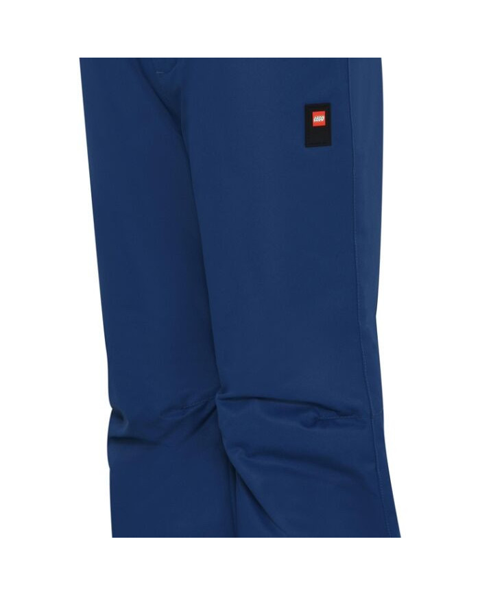 Bernumode | LEGO® Wear Tec: Kids' waterproof ski pants, LWPAYTON 701 (120 g.) €44.01 LEGO® ski pants for girls and boys
These monochrome LEGO® ski pants are a part of the ACTION series which is developed especially for skiing. Therefore, they are equipped with several practical details for that exact purpose – but they are also ideal for everyday use.
The durable ski pants have a water column of 5.000-8.000 mm and are produced with taped seams. They are windproof and breathable, too, which is essential when you are being active in the snow. They are made of durable fabric and have extra reinforcements at the leg openings. Inside at the leg openings, there is an elasticated snow skirt which is pulled over the boots, so that the snow is kept out.
THIS IS WHY YOU WILL LOVE THE TEC SKI PANTS
The ski pants are created for active play in the snow, so they are breathable and windproof
They are reinforced at the bottom hem to protect from wear and tear
The ski pants for children are designed with adjustable suspenders
There is a snow skirt inside the leg opening
The children's ski pants are closed by means of a YKK zipper, a snap button and hook and loop closure at the waist. The ski pants are elasticated at the sides for a comfortable fit. In addition to that, there are adjustable, removable, and elasticated suspenders with lovely LEGO brick details on them of the uni-coloured ski pants. The ski pants are treated with Bionic-Finish ECO which is a fluorine-free impregnation. They have one zipper pocket on the front.
 Bernumode | LEGO® Wear Tec: Kids' waterproof ski pants, LWPAYTON 701 (120 g.) €44.01 LEGO® ski pants for girls and boys
These monochrome LEGO® ski pants are a part of the ACTION series which is developed especially for skiing. Therefore, they are equipped with several practical details for that exact purpose – but they are also ideal for everyday use.
The durable ski pants have a water column of 5.000-8.000 mm and are produced with taped seams. They are windproof and breathable, too, which is essential when you are being active in the snow. They are made of durable fabric and have extra reinforcements at the leg openings. Inside at the leg openings, there is an elasticated snow skirt which is pulled over the boots, so that the snow is kept out.
THIS IS WHY YOU WILL LOVE THE TEC SKI PANTS
The ski pants are created for active play in the snow, so they are breathable and windproof
They are reinforced at the bottom hem to protect from wear and tear
The ski pants for children are designed with adjustable suspenders
There is a snow skirt inside the leg opening
The children's ski pants are closed by means of a YKK zipper, a snap button and hook and loop closure at the waist. The ski pants are elasticated at the sides for a comfortable fit. In addition to that, there are adjustable, removable, and elasticated suspenders with lovely LEGO brick details on them of the uni-coloured ski pants. The ski pants are treated with Bionic-Finish ECO which is a fluorine-free impregnation. They have one zipper pocket on the front.
