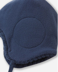 Bernumode | Reima: Детская шапка на завязках, Paljakka 21,00 € Шапочка для малышей изготовлена из смесового трикотажа с флисовой подкладкой. Ветрозащитные наушники для комфорта. 
Вязаная шапка для малышей Reima изготовлена из теплого полушерстяного трикотажа. Идеально согреет малышей благодаря натуральной шерсти. Флисовая подкладка теплая и комфортная, а ветронепроницаемое покрытие по бокам защищает маленькие уши.  

Мягкий и теплый трикотаж из смеси шерсти.  
Мягкая и теплая флисовая подкладка.  
Ветрозащитные наушники 
  Помпон сверху  
Красивый дизайн .
  Светоотражающая этикетка спереди
