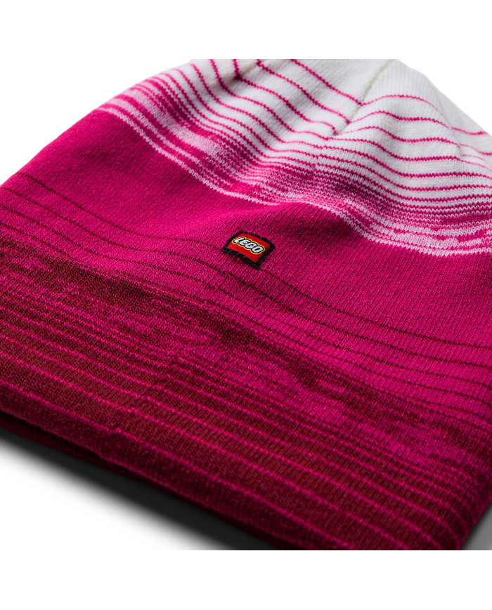 Bernumode | LEGO® Wear: Зимняя шапка на девочку, LWALEX 704 22,28 € Теплая и яркая вязаная зимняя шапка LEGO для детей. Шапка имеет градиентный цвет с белым верхом и более темным цветом внизу. Подол отогнут для дополнительной защиты лба и ушей.
