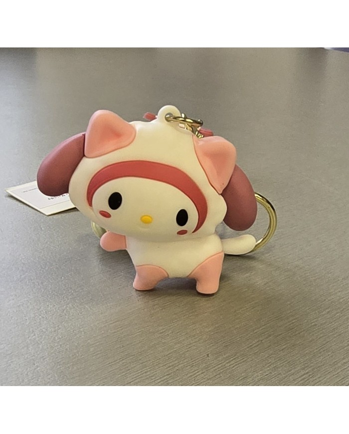 Bernumode | 3D Keychain -Sanrio, Hello Dog, My Melody €3.22 
My Melody is a character created by the Japanese company Sanrio, first introduced in 1975. She is a cute rabbit that became one of the most popular characters in Sanrio's lineup, alongside Hello Kitty.
Basic Information:

Full Name: My Melody
Birthday: January 18
Nationality: Japanese
Residence: Forests on an island in Japan
Appearance: My Melody is a white rabbit with a red or pink hood (with a bow) that covers her ears. She has pink cheeks and kind eyes.

Personality:

My Melody is known for her kind and caring personality. She is very gentle and loving, always ready to help her friends.

Friends:

Cinnamoroll — one of her close friends.
Kuromi — her "antagonist," with whom she sometimes has conflicts, as Kuromi is an antagonist in the My Melody universe.

Hobbies:

She loves baking pies and is often depicted with baking ingredients or with freshly baked pies.

Influence:
My Melody became not only a favorite character for children but also a symbol of cuteness and harmony in Japanese pop culture. She has appeared on a wide range of products, including toys, clothing, accessories, and stationery.
