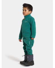 Bernumode | Didriksons: Monte Kids' Pants 9 - Kids' Fleece pants €10.36 Care instructions:
•Machine wash 40° gentle cycle; •Tumble dry low heat; •Do not dry clean; •Do not bleach; •Iron low heat.
Functions:
•4way stretch: The fabric flexes in all directions for maximum comfort and flexibility;
•ECO Shell fabric made of partly recycled fibres;
•Elastic in waist: Flexible and snug fit to prevent the cold from seeping in;
•String at waist: Adjust and secure the fit to keep the garment in place.
Descriptions:
Monte fleece pants are made of a soft and thin fleece with a brushed lining. They have a regular fit with straight legs and an adjustable waist. Made of 25% recycled polyester.