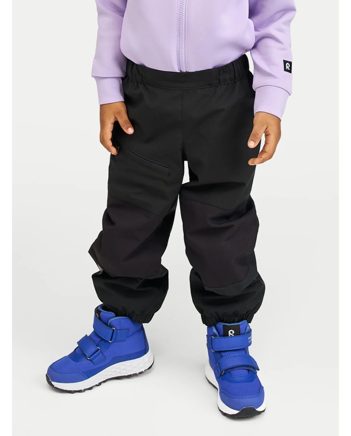 Bernumode | Reima: Kids SoftShell waterproof pants Softshell, Oikotie €41.28 Wind-blocking kids' softshell pants. Loose fit with an adjustable, elasticated waist. Fleece interior for extra warmth and comfort. Easy to pull on.Note that the seams are not sealed, so product is not completely waterproof.These kids' breathable and windproof pants are made from Reima's dirt- and water-repellent softshell material that contains recycled fibres. Thanks to the fleece interior, the stretchy, adjustable waist and the elasticated hems, this design is really comfortable to wear.

Blocks wind outside, yet breathes
Bonded material, fleece on reverse for warmth
Elastic, adjustable waist
Elastic leg ends
Sizes 92-128 with buttons for leg loops
Reflective details
