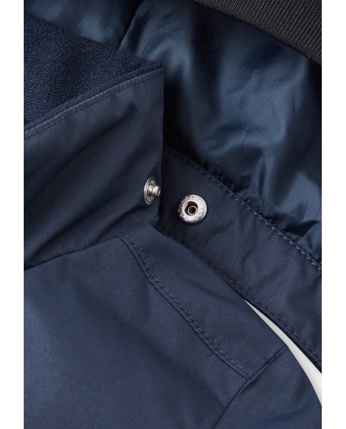 Bernumode | Reima: Mid-season children's overall, Marte Mid (80g) €70.25 

This lightly insulated retro overall for toddlers is the perfect choice for milder winters. Say moi to our classic toddlers' one-piece that was inspired by the distinctive Reima design style of the 1970s. It was first introduced in 2014 and thanks to its bold features and uncompromising functionality, it immediately became a hit among Nordic parents.
During the years, we've kept the light insulation, the roomy pockets and soft rib cuffs, but added tiny touches of genius here and there to make this one-piece even more functional and even better fitting. Add fresh new colours, and you can understand why parents and kids have loved it for years.







All seams sealed waterproof
Durable material
Water- and windproof, breathable, dirt-repellent material
Smooth polyester lining
Light insulation
Insulated seat
Safe, detachable hood
Soft rib on hood edge and cuffs
Two flap pockets
Waist adjustment inside
Detachable, adjustable and durable silicone foot loops
Elastic leg ends
Reflective details

Normal machine wash at warm (40°C). Do not bleach. Iron low. Do not dry clean. Drying at lower temperature.





