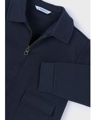 Bernumode | Mayoral: Zip-up jacket for boys €30.17 Boys’ long-sleeve hoodie with a shirt-style collar. Front central zipper closure. Classic piqué fabric, versatile and durable. Front pockets for functionality. Bernumode | Mayoral: Zip-up jacket for boys €30.17 Boys’ long-sleeve hoodie with a shirt-style collar. Front central zipper closure. Classic piqué fabric, versatile and durable. Front pockets for functionality.