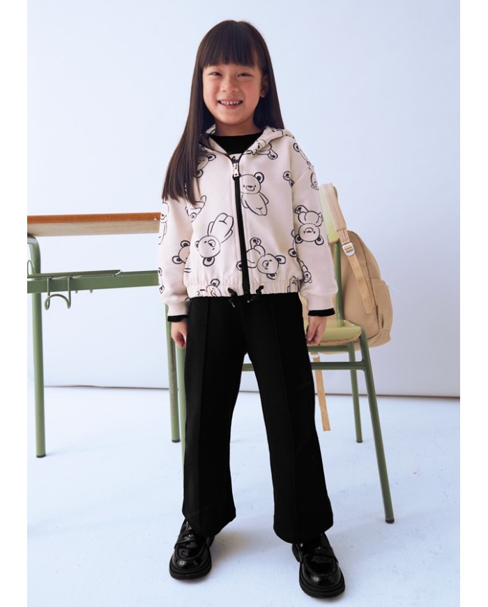 Bernumode | Mayoral: 2 trousers tracksuit for girl €41.74 Three-piece girls’ sports set consisting of a long-sleeve hoodie sweatshirt with front zipper and adjustable drawstring at the hem, and two pairs of elastic-waist sports pants. One pair features elastic cuffs and functional front pockets. Decorative elements: print. Perfect set for active play and everyday wear.
