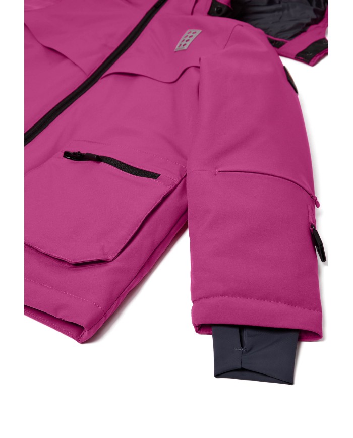Bernumode | Lego: Winter jacket  for girl LWJAD 804 (140 g) €74.34 Functional LEGO® winter jacket for kids
Keep your child warm and comfortable during winter adventures with this LEGO® winter jacket. Designed for boys and girls, this ski jacket combines classic LEGO elements with practical features to ensure a cozy and safe experience in cold weather.
Provides protection from the rain with a 10,000 mm water column
BIONIC-FINISH ECO® water-repellent finish on the surface
Windproof design with a wind placket under the quality YKK main zipper
3M™ Scotchlite reflector badges on front and back shaped as LEGO bricks, enhancing visibility in the dark
Detachable hood mounted on a unique snap button band for safety
Safety breakaway buckle for attaching LEGO gloves to sleeves in sizes 98-140
Hidden ski pass pocket with zipper closure in the sleeve - a must when skiing
Snow skirt with gripper elastic inside the jacket to keep snow out
Stretchy inner cuff with thumbhole for added warmth and comfort
The taped seams provide additional protection against the elements
Durability: 60,000 rubs
The children's winter jacket is designed with a soft chin guard at the top of the YKK main zipper to protect the delicate skin under the chin. The ski jacket is designed with a safety breakaway buckle for attaching LEGO mittens or gloves to the sleeves in sizes 98-140. If the mitten is pulled at, it releases from the jacket sleeve, reducing the risk of accidents. The detachable hood is mounted on a unique snap button band for safety reasons. When pulled at, the hood releases from the outerwear to reduce the risk of accidents where the kids are stuck on something with the hood. The elastic at the hood opening and reflective thread in the zipper puller at front pockets add to the jacket's functional design. Thanks to the many awesome ski features, the water- and windproof winter jacket is ideal for skiing as well as everyday life.
Specifications• -15 degrees Celsius / 5 Fahrenheit.• 3M reflective badge.• BIONIC-FINISH ECO® water-repellent finish on the surface.• Breathability: 4.000 g/m2/24hours.• Detachable hood.• Durability: 60.000 rubs.• Elastic at hood opening.• Reflective thread in zipper puller at front pockets.• Safety breakaway buckle for attaching the gloves to sleeves. The buckle releases when pulling the gloves.• Safety breakaway buckle only in size 98-140.• Ski pass pocket with zipper closure.• Snow skirt with gripper elastic inside jacket.• Stretchy inner cuff with thumbhole.• Taped seams.• Water column: 10.000 mm.• Wind placket under main zipper.• Windproof.• YKK main zipper.• Zipper pocket(s) on front.
 Bernumode | Lego: Winter jacket  for girl LWJAD 804 (140 g) €74.34 Functional LEGO® winter jacket for kids
Keep your child warm and comfortable during winter adventures with this LEGO® winter jacket. Designed for boys and girls, this ski jacket combines classic LEGO elements with practical features to ensure a cozy and safe experience in cold weather.
Provides protection from the rain with a 10,000 mm water column
BIONIC-FINISH ECO® water-repellent finish on the surface
Windproof design with a wind placket under the quality YKK main zipper
3M™ Scotchlite reflector badges on front and back shaped as LEGO bricks, enhancing visibility in the dark
Detachable hood mounted on a unique snap button band for safety
Safety breakaway buckle for attaching LEGO gloves to sleeves in sizes 98-140
Hidden ski pass pocket with zipper closure in the sleeve - a must when skiing
Snow skirt with gripper elastic inside the jacket to keep snow out
Stretchy inner cuff with thumbhole for added warmth and comfort
The taped seams provide additional protection against the elements
Durability: 60,000 rubs
The children's winter jacket is designed with a soft chin guard at the top of the YKK main zipper to protect the delicate skin under the chin. The ski jacket is designed with a safety breakaway buckle for attaching LEGO mittens or gloves to the sleeves in sizes 98-140. If the mitten is pulled at, it releases from the jacket sleeve, reducing the risk of accidents. The detachable hood is mounted on a unique snap button band for safety reasons. When pulled at, the hood releases from the outerwear to reduce the risk of accidents where the kids are stuck on something with the hood. The elastic at the hood opening and reflective thread in the zipper puller at front pockets add to the jacket's functional design. Thanks to the many awesome ski features, the water- and windproof winter jacket is ideal for skiing as well as everyday life.
Specifications• -15 degrees Celsius / 5 Fahrenheit.• 3M reflective badge.• BIONIC-FINISH ECO® water-repellent finish on the surface.• Breathability: 4.000 g/m2/24hours.• Detachable hood.• Durability: 60.000 rubs.• Elastic at hood opening.• Reflective thread in zipper puller at front pockets.• Safety breakaway buckle for attaching the gloves to sleeves. The buckle releases when pulling the gloves.• Safety breakaway buckle only in size 98-140.• Ski pass pocket with zipper closure.• Snow skirt with gripper elastic inside jacket.• Stretchy inner cuff with thumbhole.• Taped seams.• Water column: 10.000 mm.• Wind placket under main zipper.• Windproof.• YKK main zipper.• Zipper pocket(s) on front.