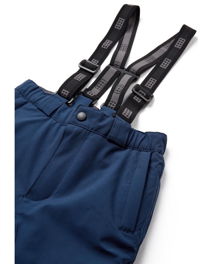 Bernumode | Lego: Kids' waterproof ski pants, LWPOWAI 708  (120 g) €66.90 Durable LEGO® ski pants for kids
These LEGO® ski pants are designed to keep boys and girls comfortable and protected during winter adventures. With a focus on functionality and style, these pants are perfect for skiing and other snowy activities.They have a 10.000 mm water column and are manufactured with fully taped seams to ensure that they keep your son or daughter dry on the playground as well as on the slopes. The durable, breathable, windproof, and even completely waterproof ski pants are reinforced at the leg opening with Cordura reinforcement and have a snow skirt with gripper elastic inside to keep snow out.

Water column of 10,000 mm provides protection from the rain
BIONIC-FINISH ECO® water-repellent finish on the surface
Windproof design to keep the cold at bay
Durability: withstand 60,000 rubs
Cordura reinforcement at the leg opening and inseam for durability
Fully taped seams to ensure that the snowpants are waterproof
Length extension feature inside legs for growing kids
3M reflective piping at the bottom part of the ski pants
Detachable and adjustable suspenders for a perfect fit
The integrated elastics at the waist provide added comfort
Snow skirt with gripper elastic inside bottom legs to keep snow out
Quality YKK main zipper and snap button closure
Zipper pockets on the front

The pants feature a breathable design with a breathability rating of 4,000 g/m2/24hours, ensuring comfort during active play. The reflective thread in the zipper puller at the front pockets adds a touch of safety, while the snap button at the front opening ensures easy wear. Inside the ski pants, there is a smart feature: The length of the trousers can be adjusted by one size, so they can be worn for a longer period of time. All in all, these high-quality ski pants will make your kid's winter adventures even more fun!
Specifications• -15 degrees Celsius / 5 Fahrenheit.• 3M reflective piping.• BIONIC-FINISH ECO® water-repellent finish on the surface.• Breathability: 4.000 g/m2/24hours.• Cordura reinforcement.• Detachable and adjustable suspenders.• Durability: 60.000 rubs.• Elastic at waist sides.• Fully taped seams.• Length extension feature inside legs.• Reflective thread in zipper puller at front pockets.• Snap button at front opening.• Snow skirt with gripper elastic inside bottom legs.• Water column: 10.000 mm.• Windproof.• YKK main zipper.• Zipper pocket(s) on front.
