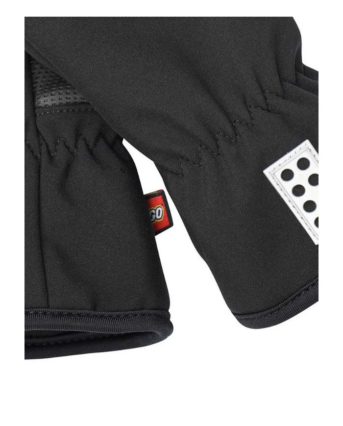 Bernumode | Lego wear: Kids' softshell gloves,LWATLIN 705 €22.28 SOFTSHELL GLOVES FOR BOYS AND GIRLSIn-between seasons, these softshell gloves are excellent. Use them in early spring or autumn so that your child’s hands are kept warm even on chilly mornings.The LEGO® gloves for boys and girls are made in a water-repelling softshell quality and have a soft inside made of microfleece.THIS IS WHY YOU WILL LOVE THE GLOVES•    The gloves have an anti-slip material on the palms for a better grip•    There is a small hook at the wrist to attach the gloves to each other when they are not in use – they won’t get lost that easily•    The softshell gloves are equipped with touch screen function on thumb and index finger so that your child can keep the gloves on while using his or her smartphone.The gloves have an ergonomically correct design and an elasticated wrist for optimum fit. Material and careSoftshell bonded with 100% polyester microfleece 280 gsm.•    96% polyester/4% elastane, woven•    40° Machine wash warm with similar colours•    Do not dry clean•    Do not iron•    Do not tumble dry, line drying in the shade.•    Do not bleach or use detergents w optical bleachesSpecifications•    Elastic at wrist keeps the glove in place.•    Elasticated binding at opening.•    Soft microfleece lining inside gloves.•    Ergonomic fit.•    Water resistant.•    Windproof.•    PU anti-slip material on palm for better grip.•    3M Scotchlite reflector.•    Touchscreen compatible fingertips allow devices to sense touch without removing the glove.•    Bionic Finish ECO water repellent finish on the surface.•    Windproof.