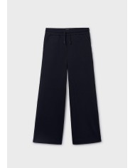 Bernumode | Mayoral: Спортивные брюки на девочку 23,55 € Брюки-клёш для девочки, широкие внизу. Регулируемая эластичная резинка с пуговицами внутри пояса для лучшей посадки. Удобная и универсальная джинсовая ткань для повседневных образов. Функциональные передние карманы. Функциональные задние карманы.